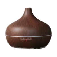 Ultrasonic essential oil diffuser in a deep wood grain finish
